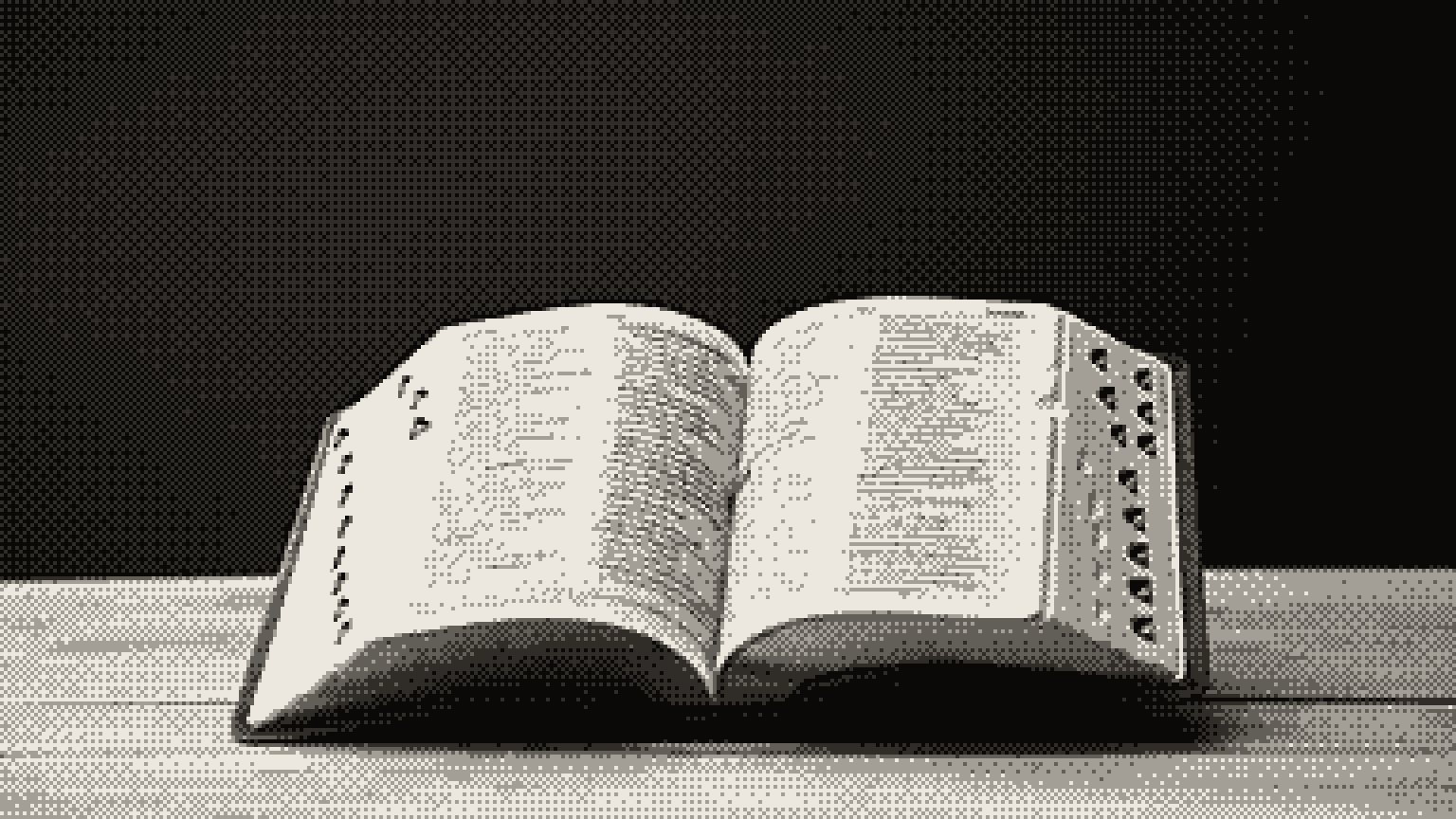 An open dictionary lying on a table against a dark background
