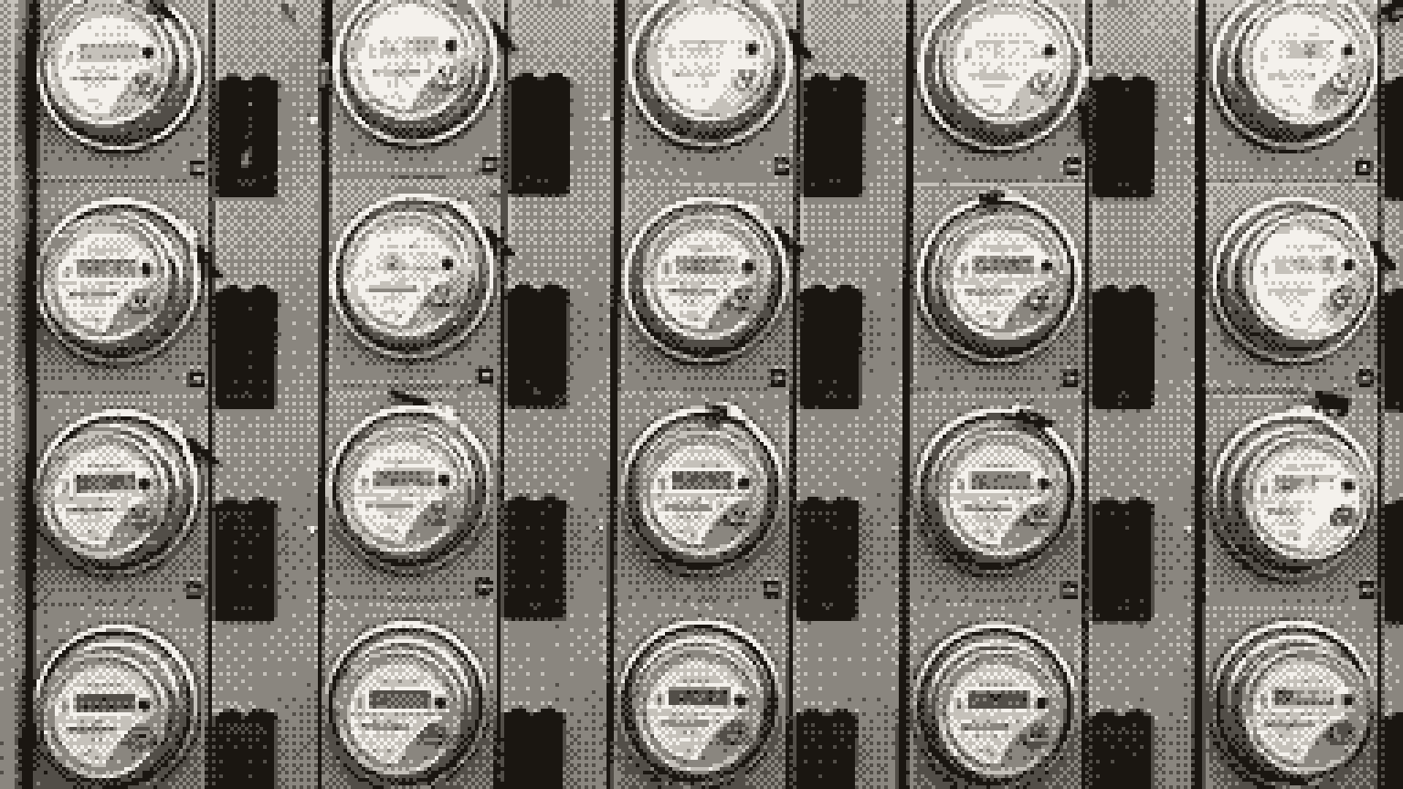 Rows of electricity meters mounted on a wall