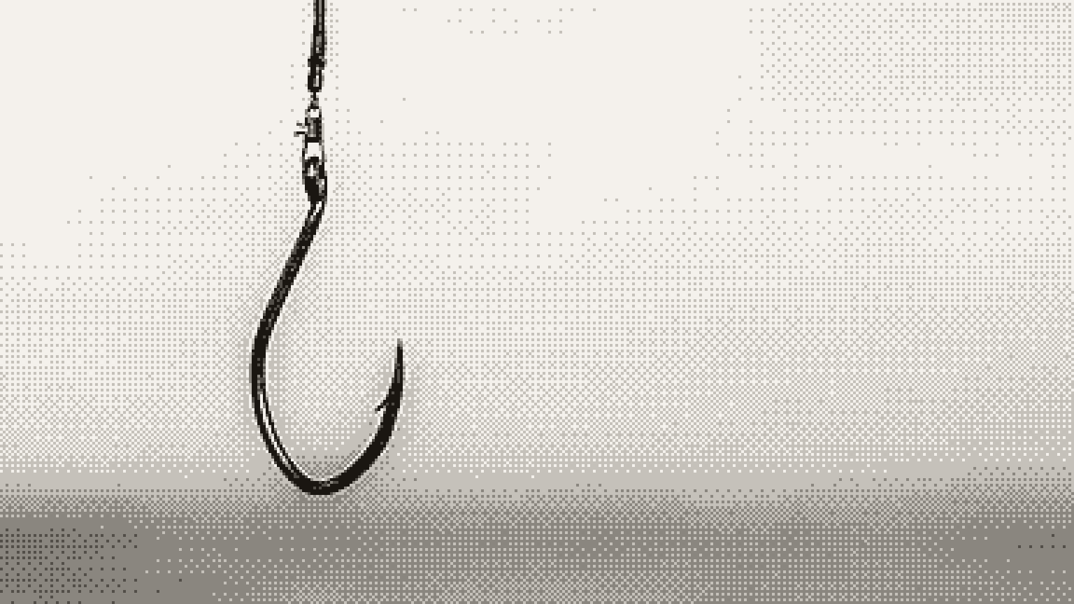 A single fishing hook hanging from a line